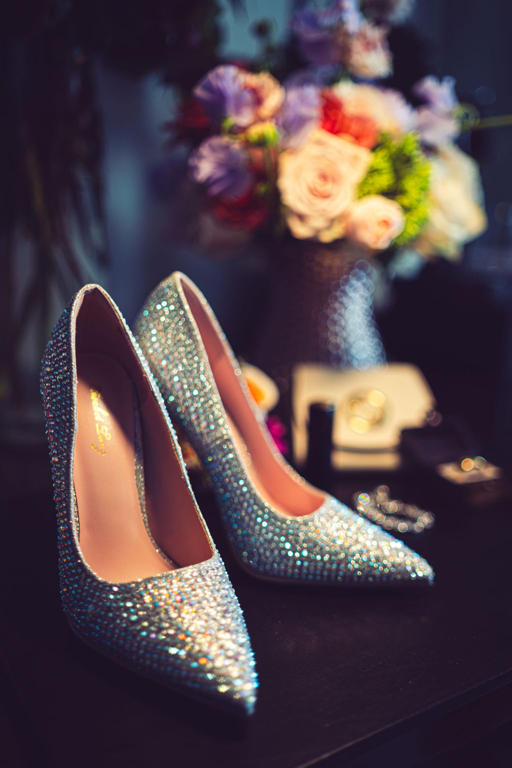 Crystal wedding shoes and colorful bouquet — Joseph Barber Photography